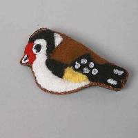 Broche en patchwork de laine Birdy