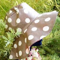 Chapeau de pluie en toile enduite